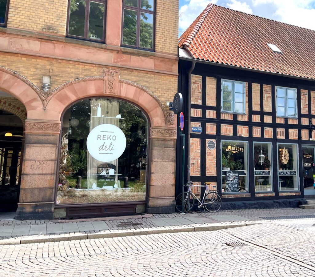 Store front windows in Lund in old brick and wood style