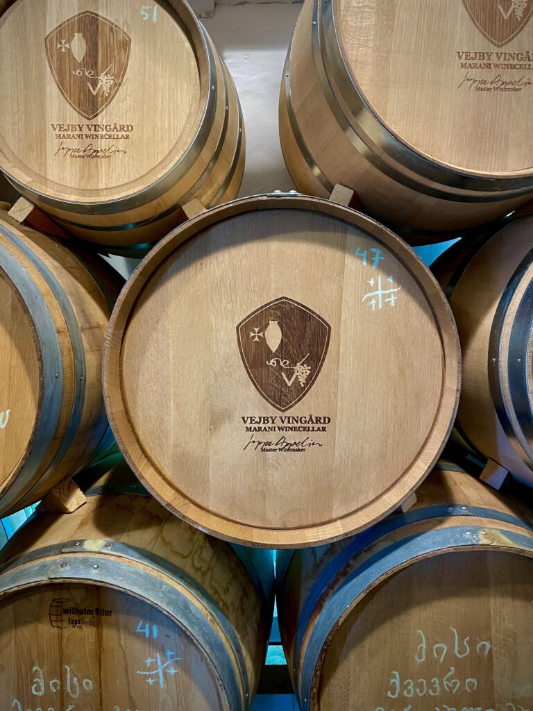 Stacked wooden wine barrels 