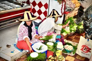 Women in market making  palm leaf cases.