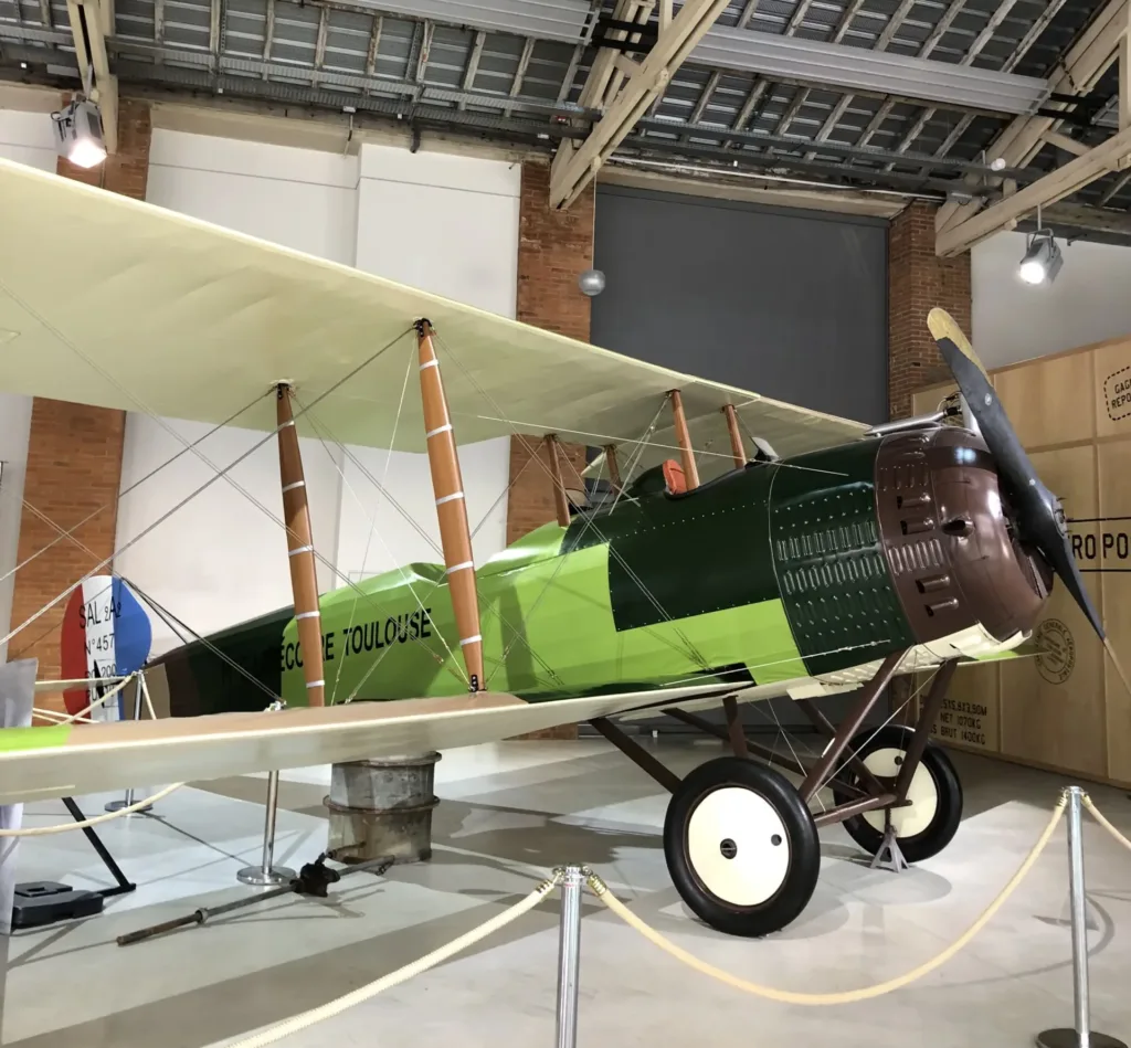 Museum exhibit of plane from start of aviation history.