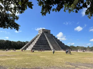 Stepped pyramid under a blue sky.