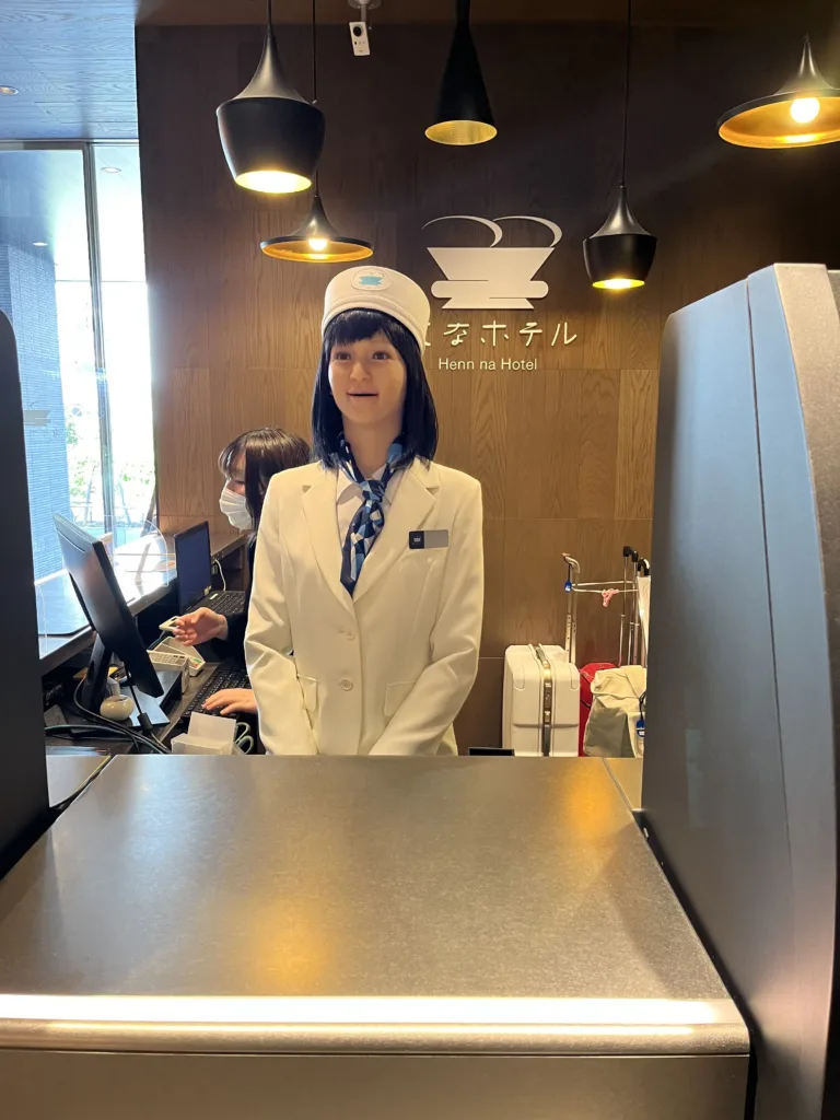 Female looking robot receptionist at a hotel.
