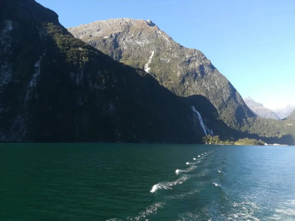 Green water with mountainous background