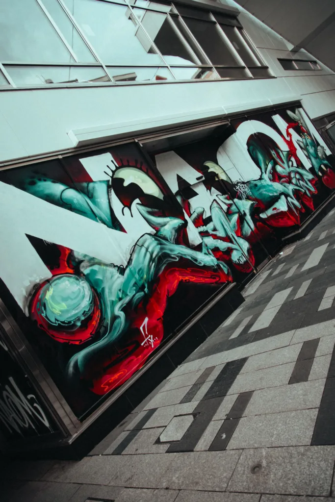 Graffiti wall reading NAOM
