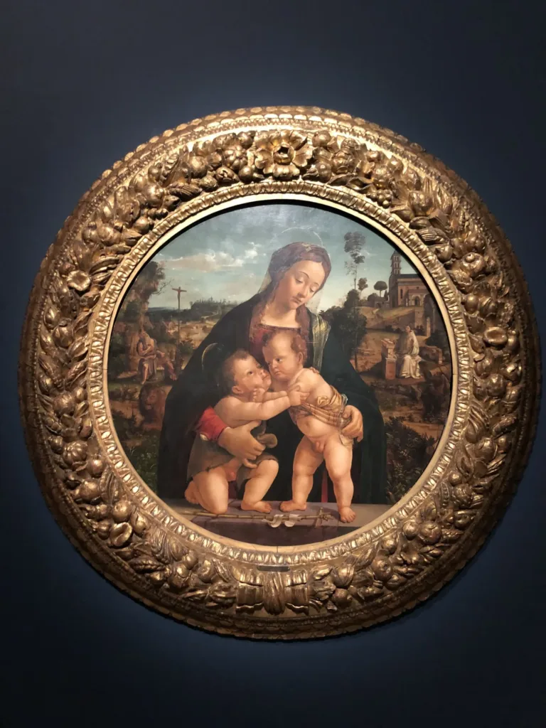 Renaissance painting of a woman with two children