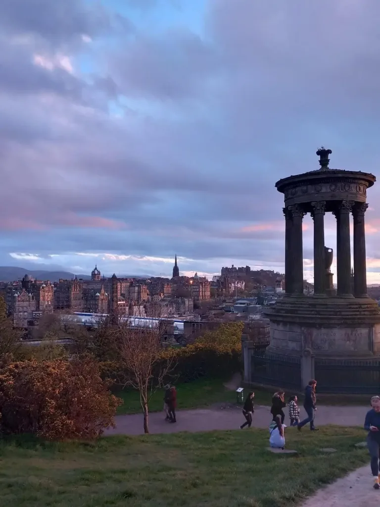 Pillared monument overlooking a city
