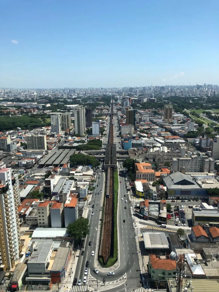View of long street from above with urban landscape
