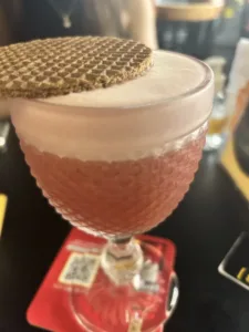 Cocktail with foam and wafer