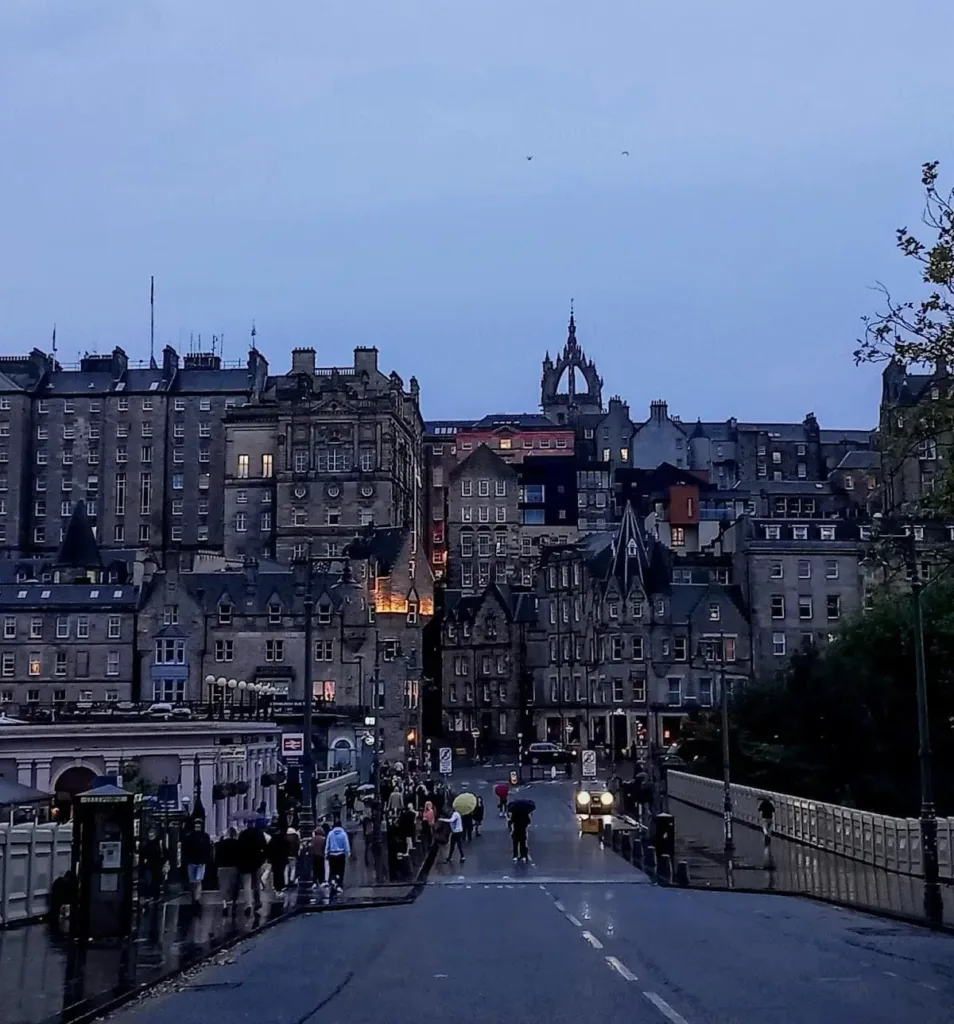 Closed built buildings seen from a bridge at dusk