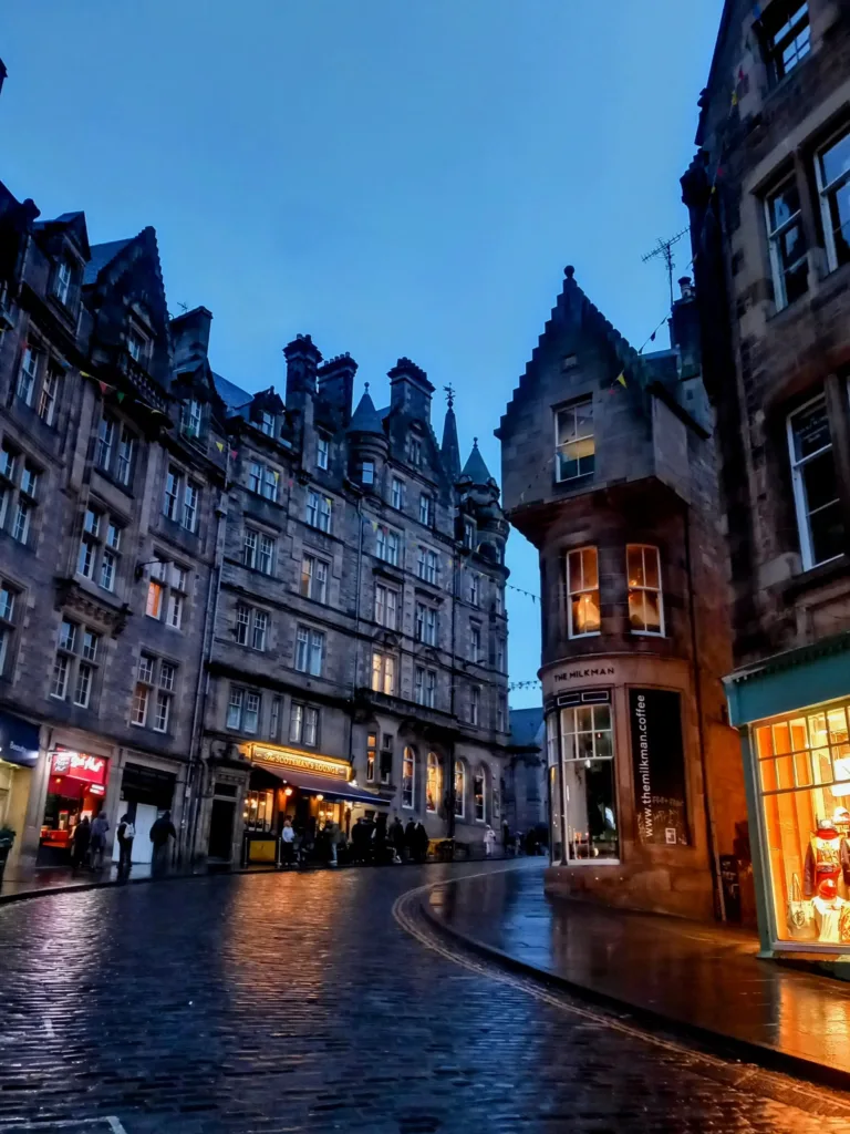 Turning street with shops in the evening