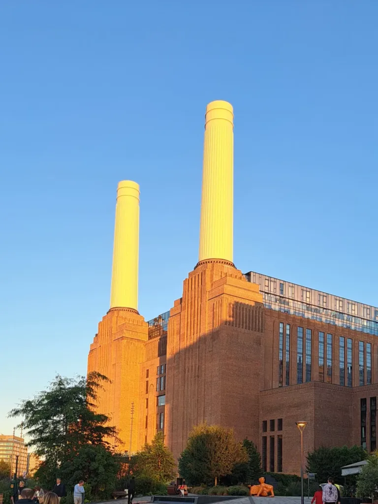 Large factory space with two white chimneys