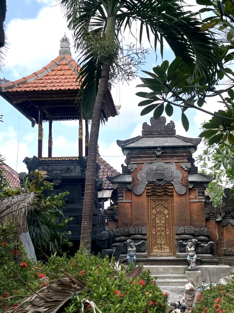 Temple door and palm trees