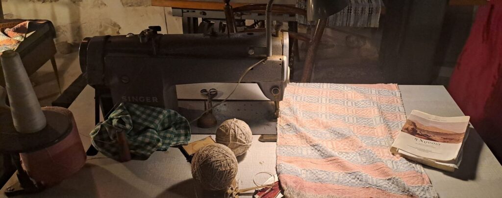 Table with sewing machine and yarn