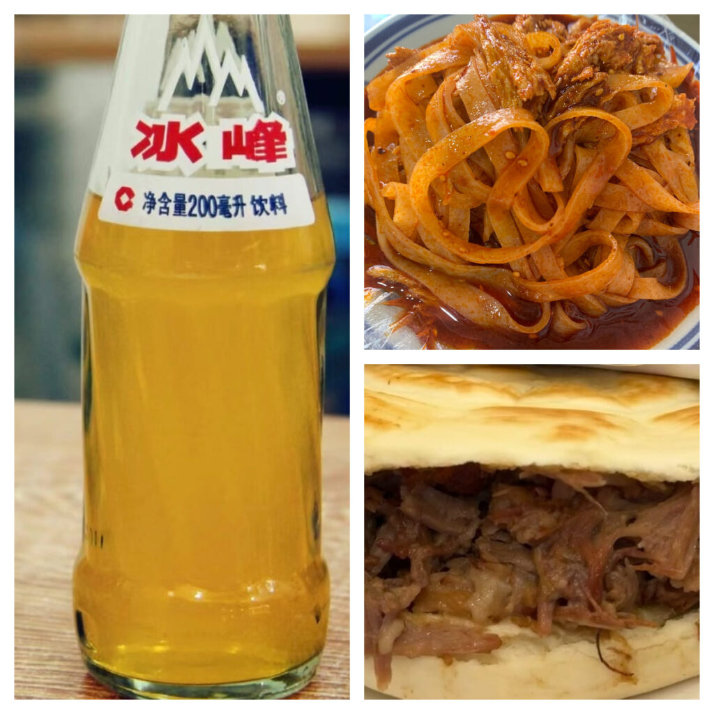 Orange sparkling soda, noodles, and bun with pulled meat