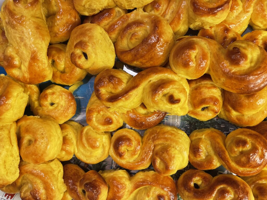 Yellow saffron buns on tray