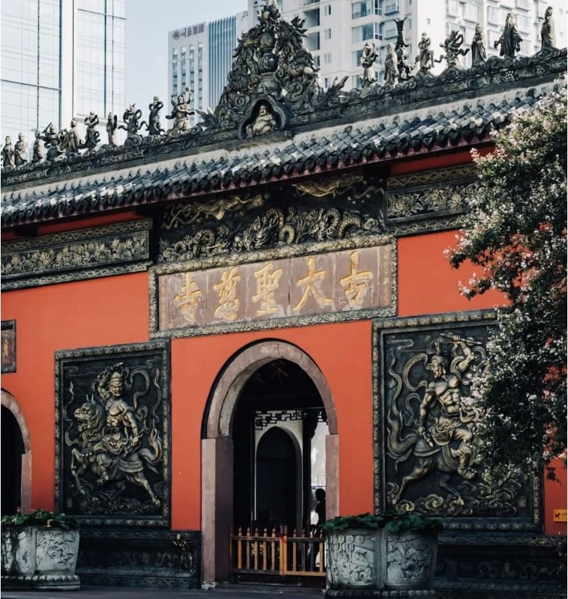 Facade entrance of Chinese temple in urban setting