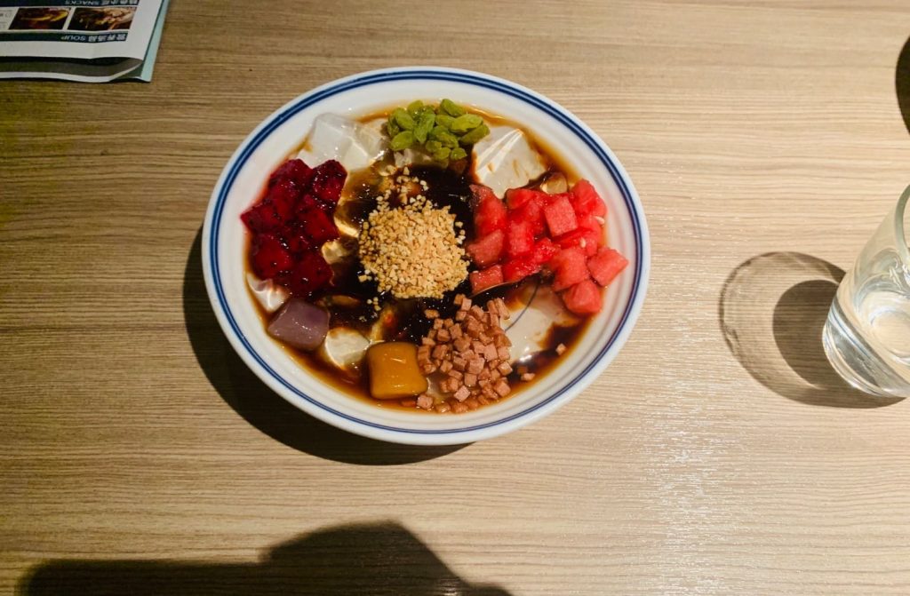 Plate of iced fruit pieces