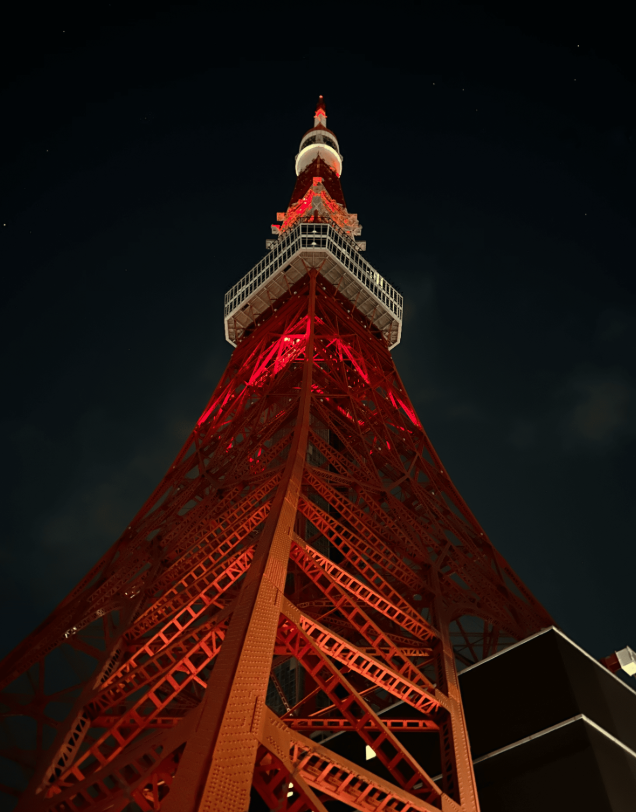 A high tower glowing in red during the evening