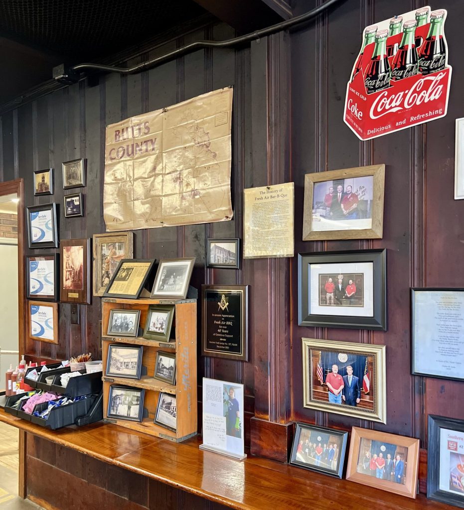 Wall of photographs and memorabilia