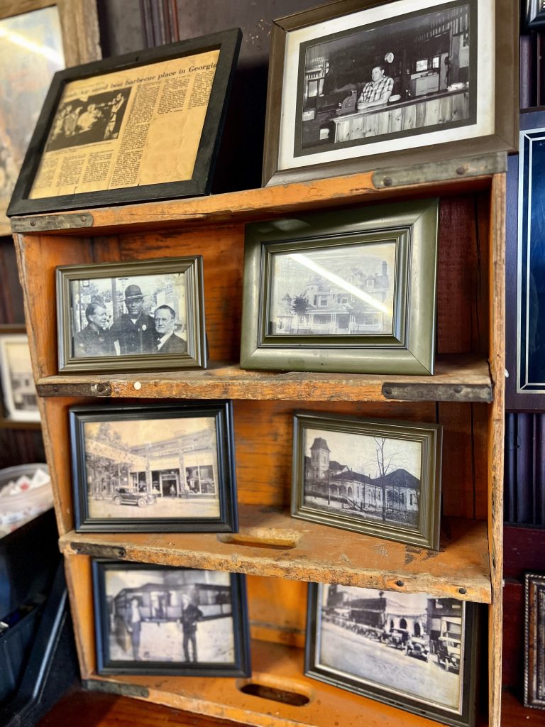 Wooden box displaying photos in two columns