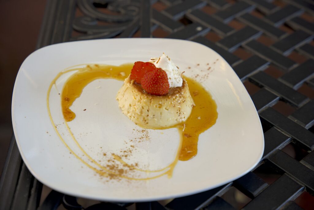 Dessert plate with flan and strawberries