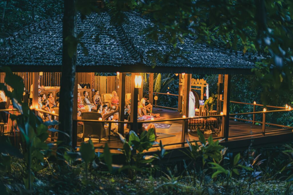 Group session at eco resort in forest