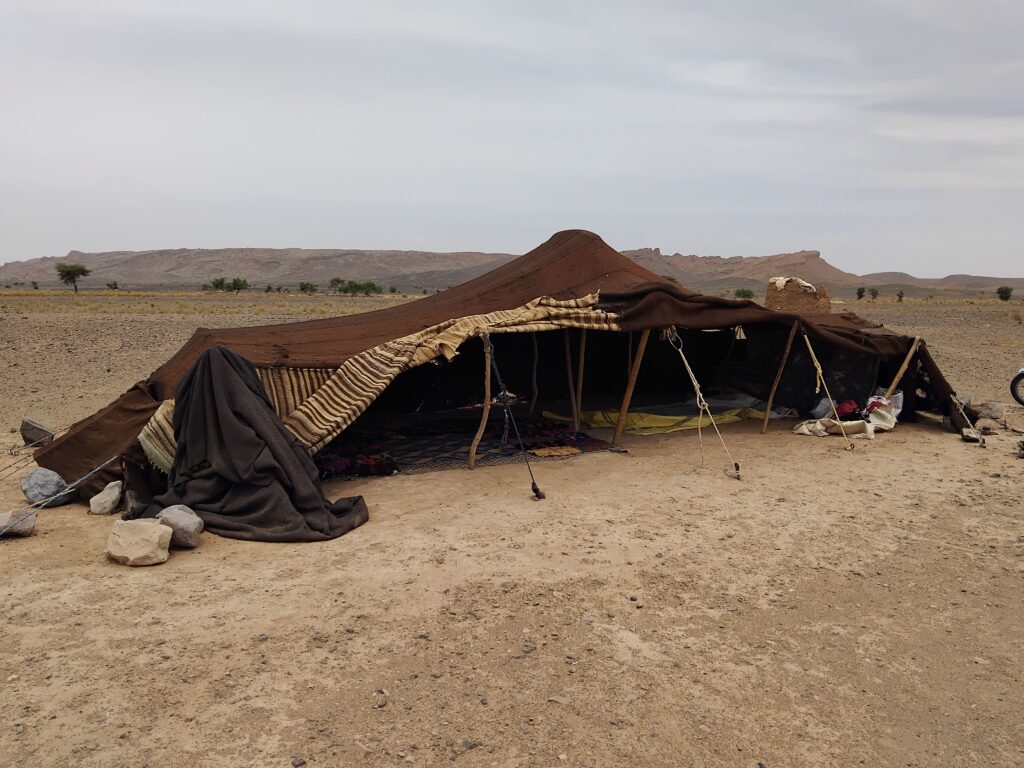 Brown tent pitched in the desert