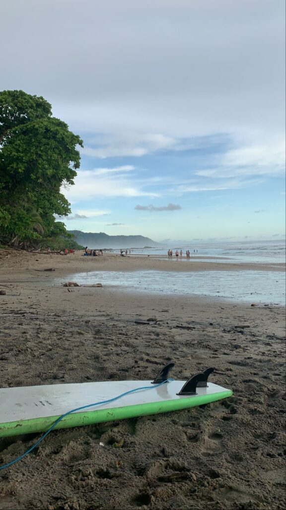 Surfboard lying on a beach