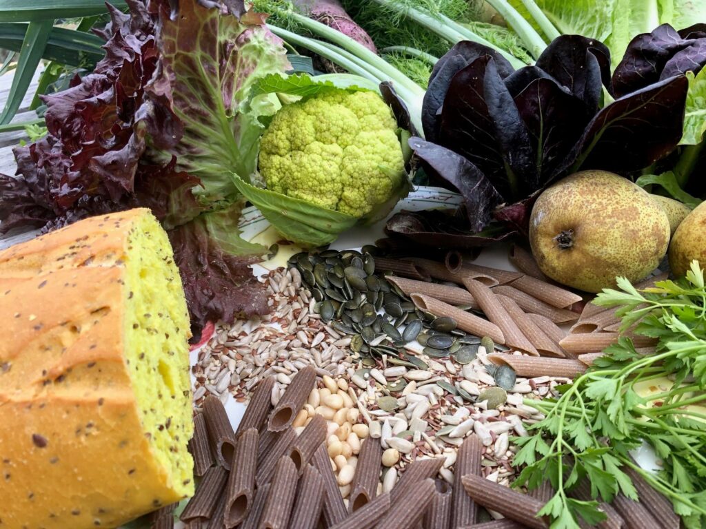 Cauliflower, potatoes, pasta, bread, and salads grouped together.
