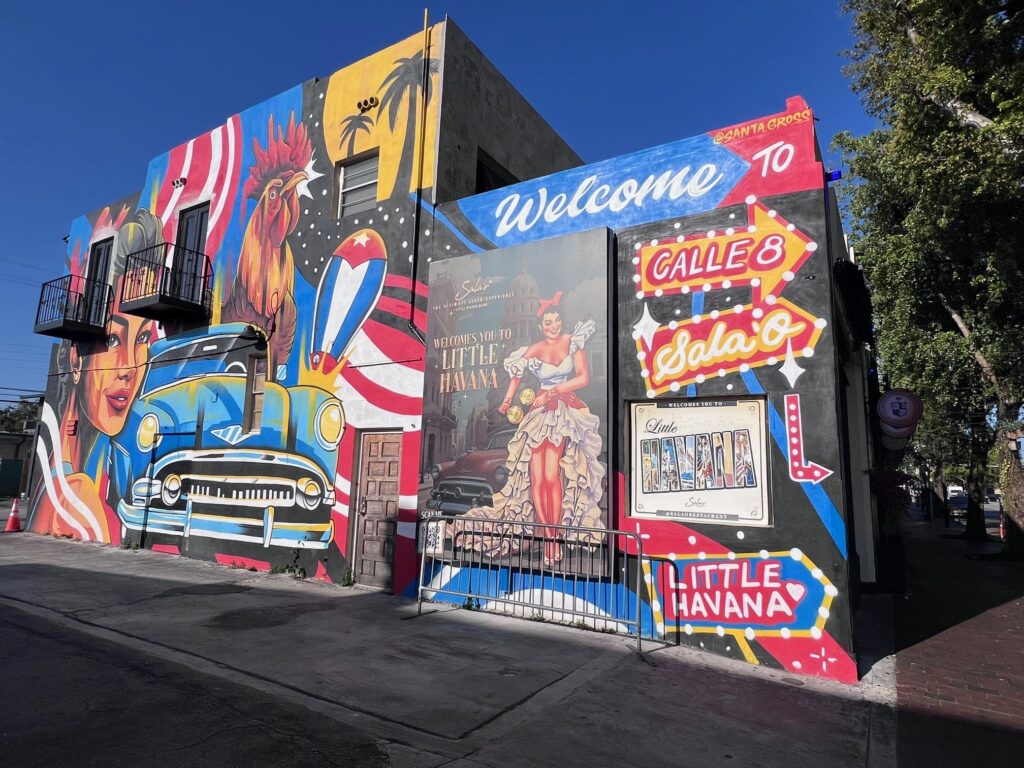 Two building walls covered in graffiti