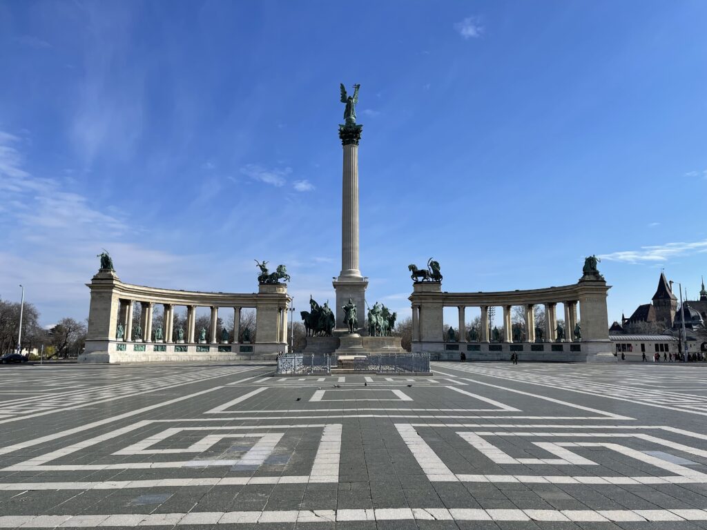 A square with a monument and pillars