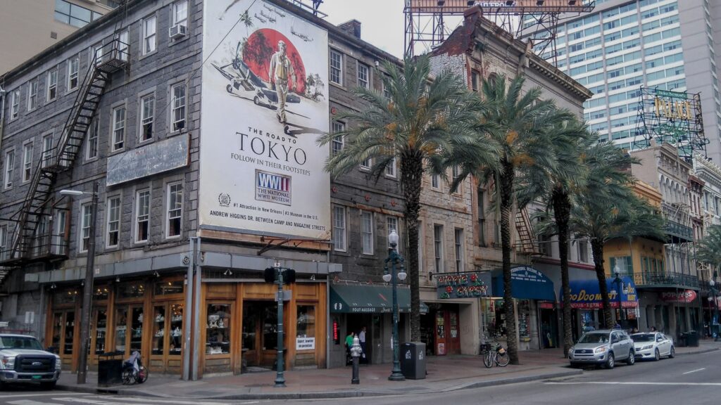 Street corner with billboard ads on the facade
