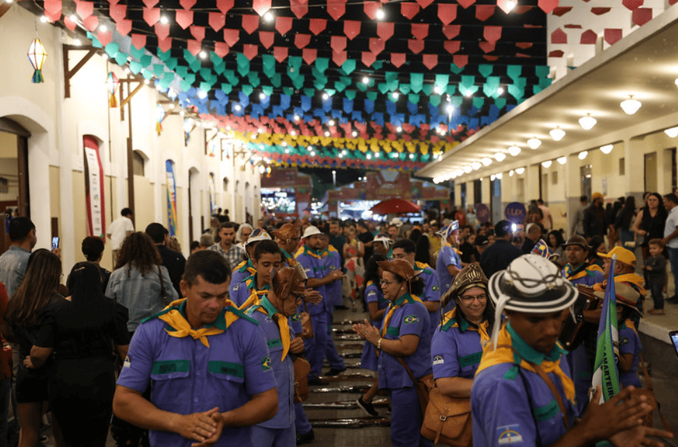 Festival with people dressed in blue shirts