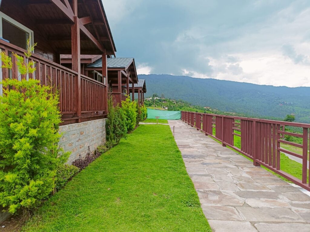 Wooden chalet houses in mountain setting
