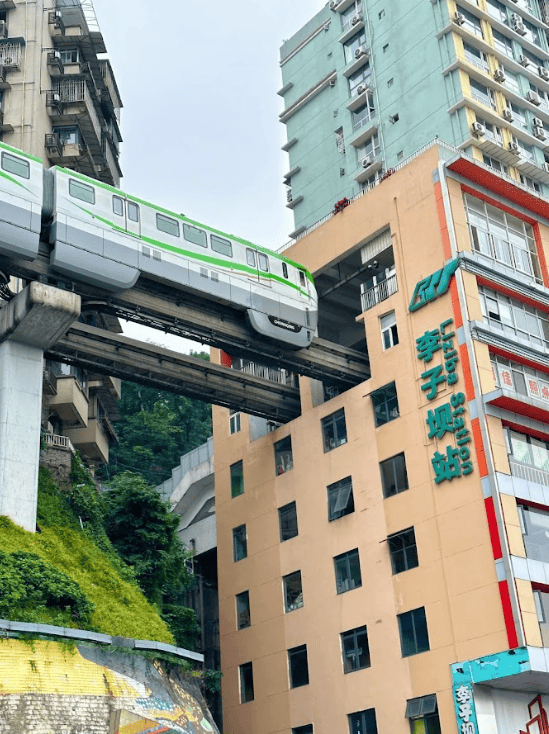 Monorail entering a high rise building
