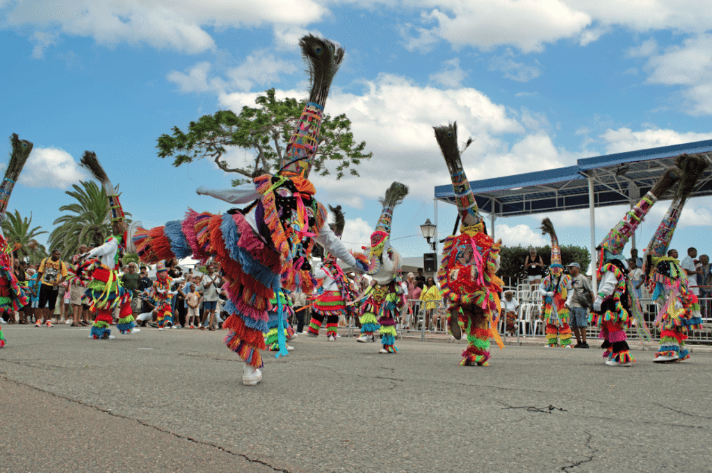 Street performance with elaborate and colourful costumes