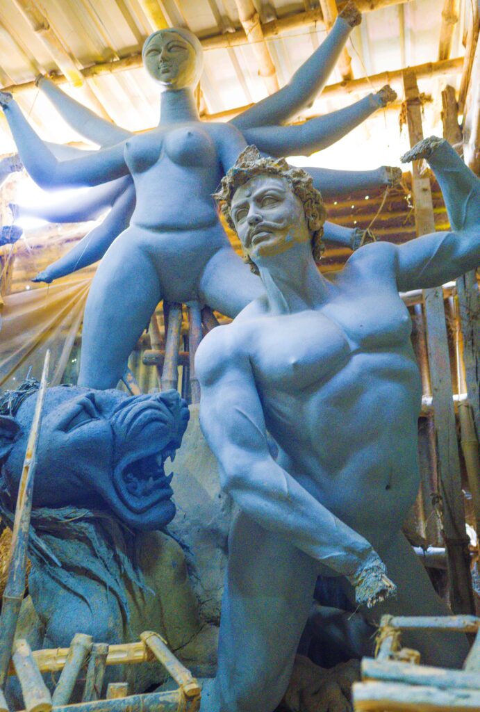 Blue statues in workshop
