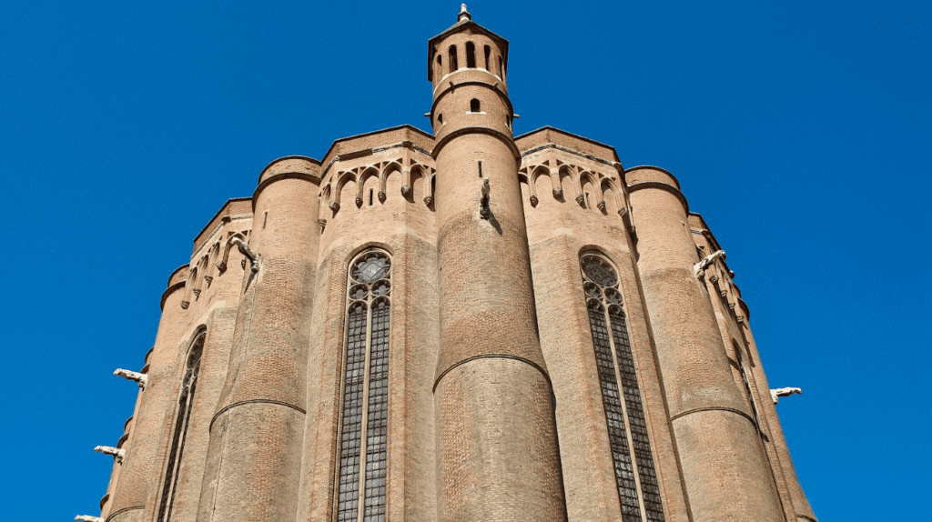 Cathedral building seen from ground in red brick