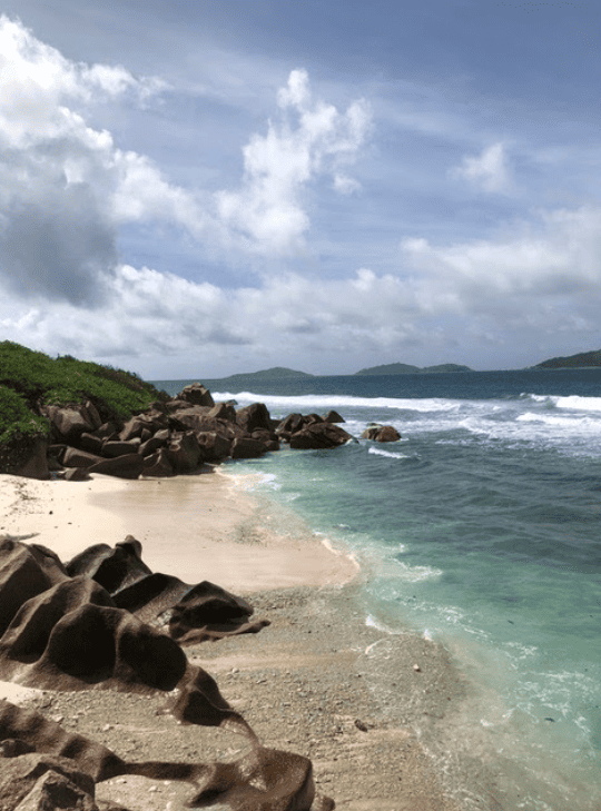 Rock formations along a tropical beach