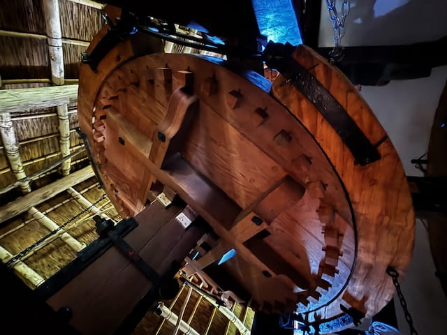 Wooden cog wheel inside a mill