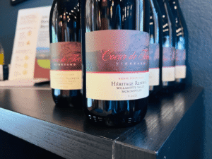 Close up of row of wine bottles on a shelf